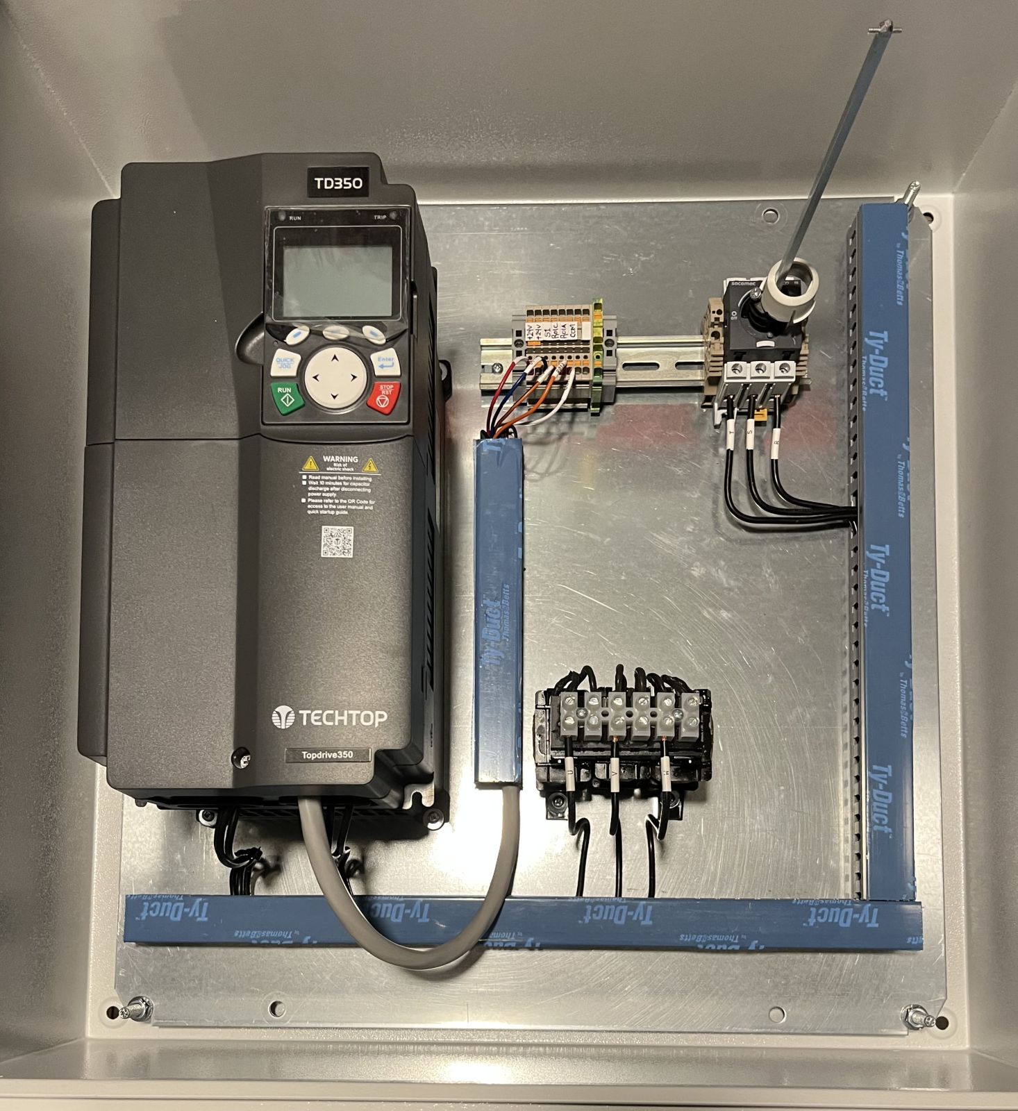 Variable frequency drive control panel with disconnect and DIN-rail terminals